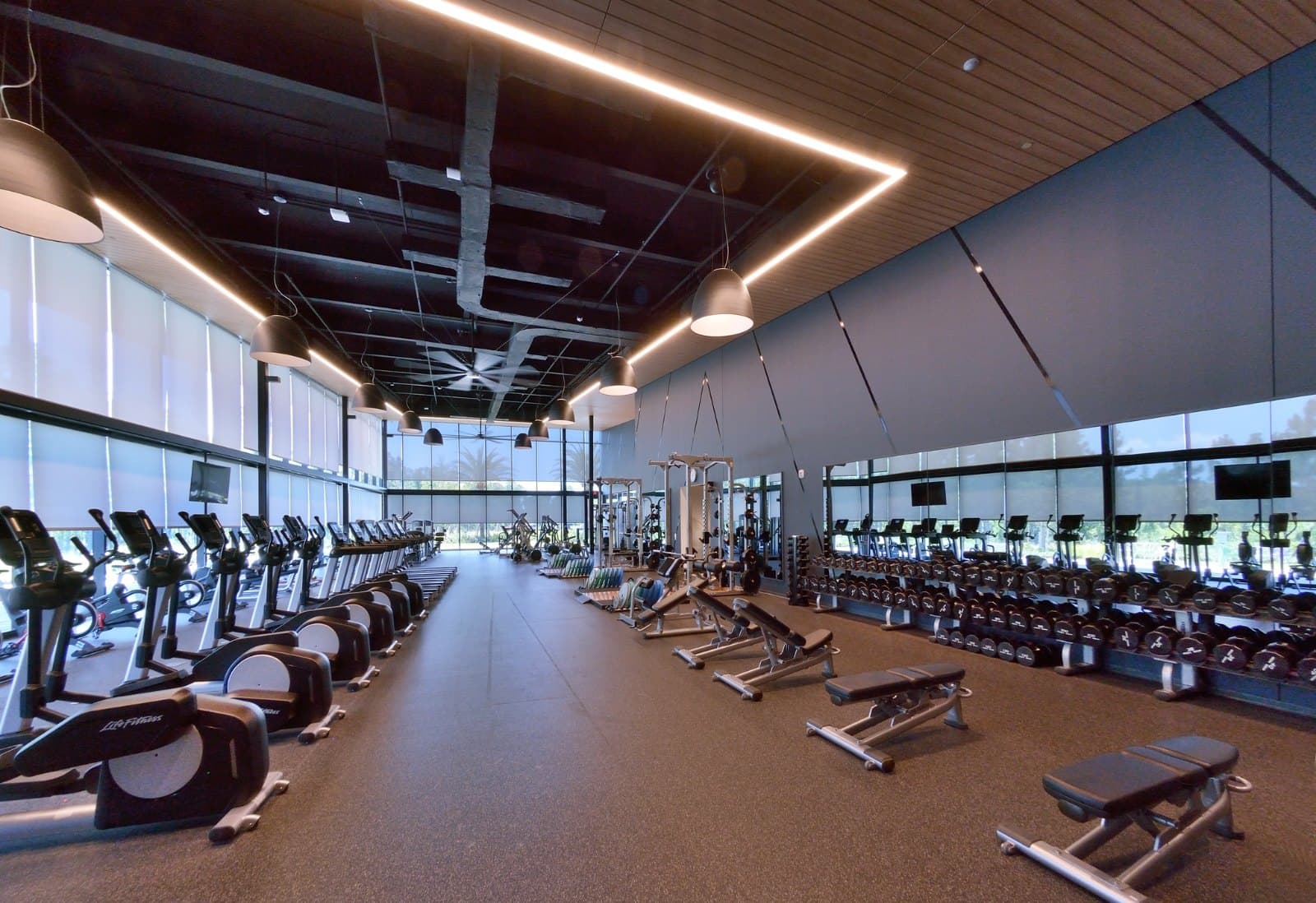 Johnson & Johnson HPI — training floor with motorized Somfy shades on the curtain wall