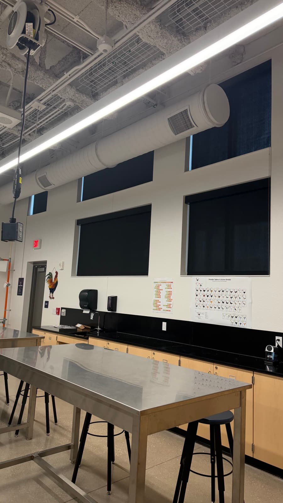 Wellen Park High School — classroom with RB500+ single manual roller shades on the tall window wall, Sarasota, FL