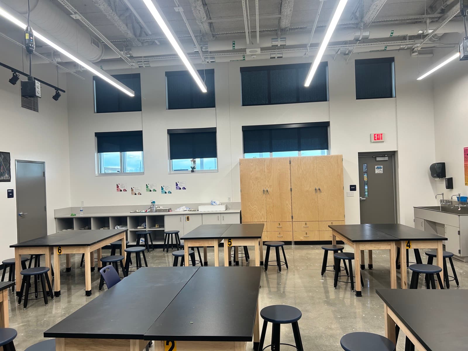 Wellen Park High School — science lab with RB500+ single manual roller shades on full-height glazing, Sarasota, FL