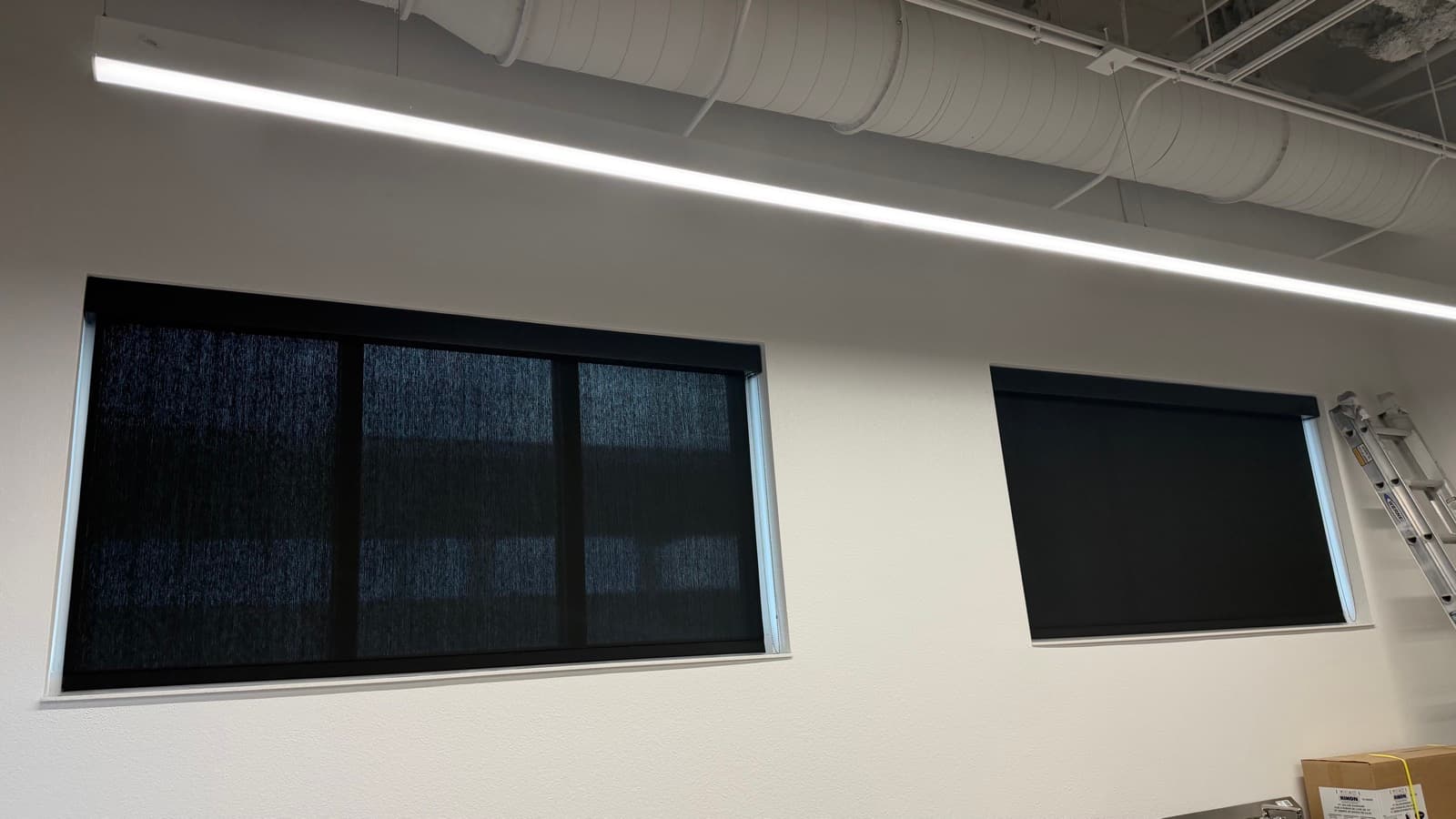 Wellen Park High School — RB500+ manual roller shades in 1% solar fabric holding a soft view through, Sarasota, FL